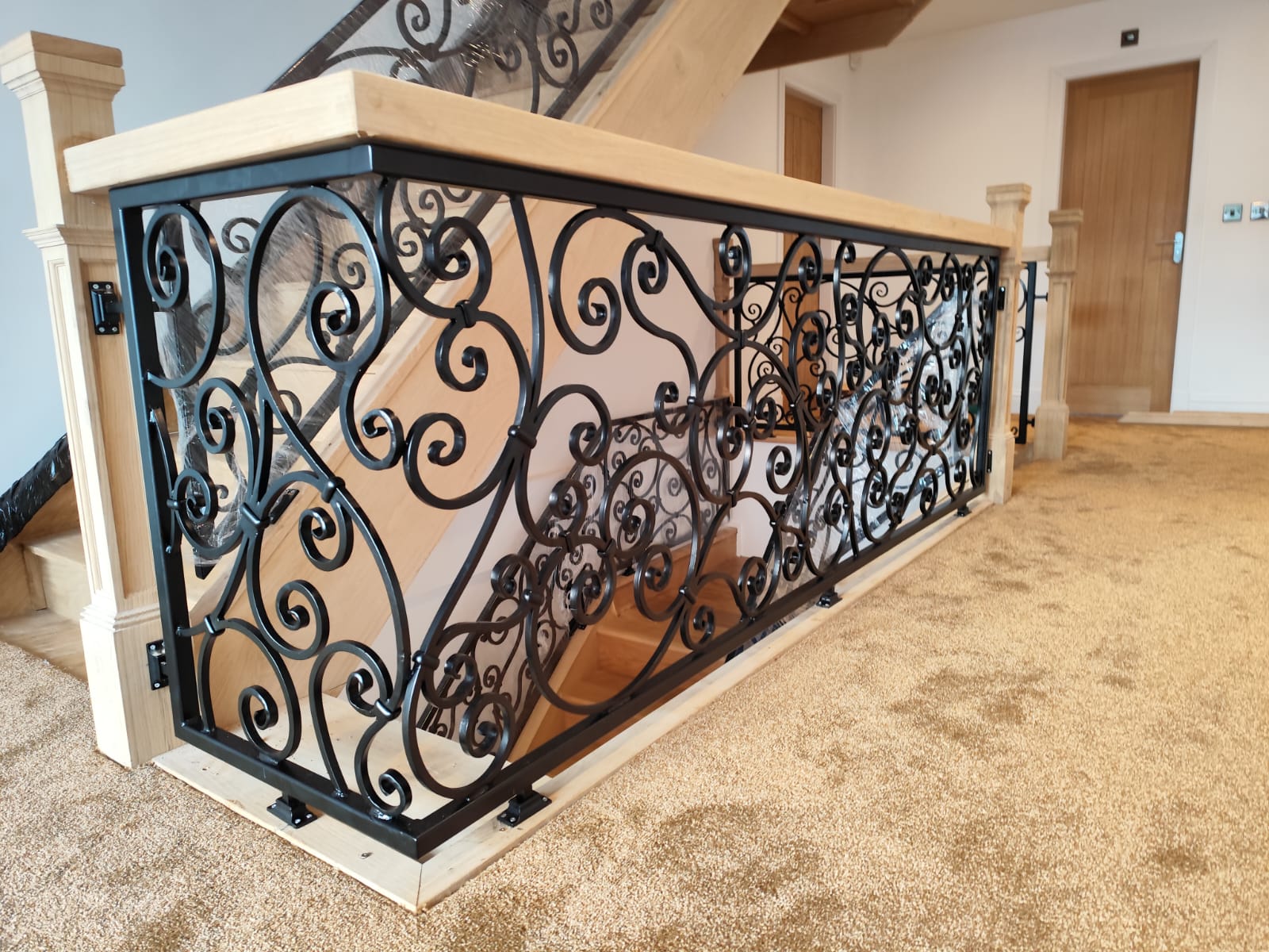 Bespoke Hand Forged Iron Staircase Railing – Elegant Scrollwork. 46
