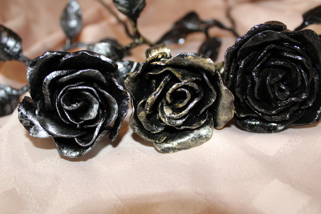 Hand forged metal wrought iron roses