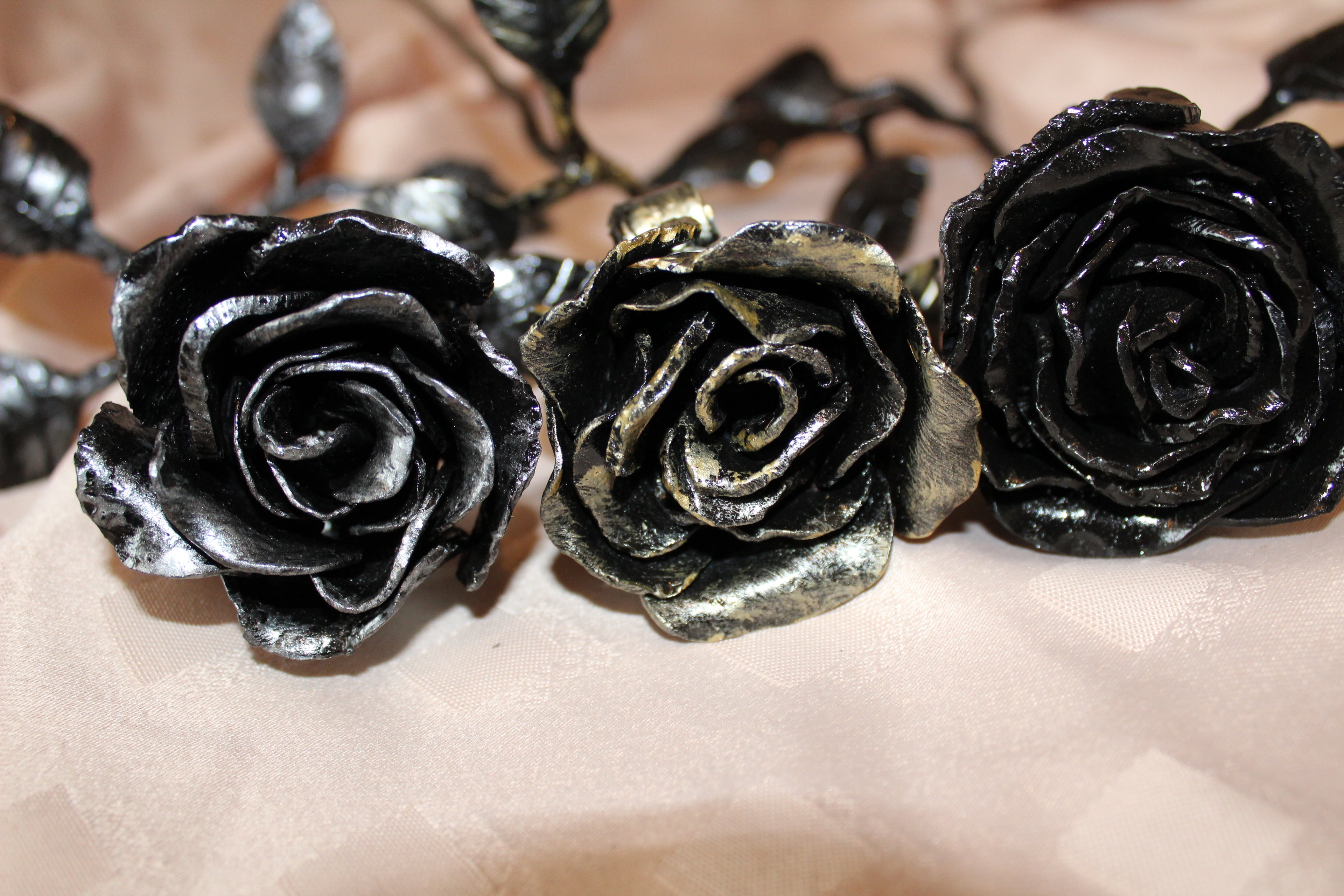Hand forged metal wrought iron roses