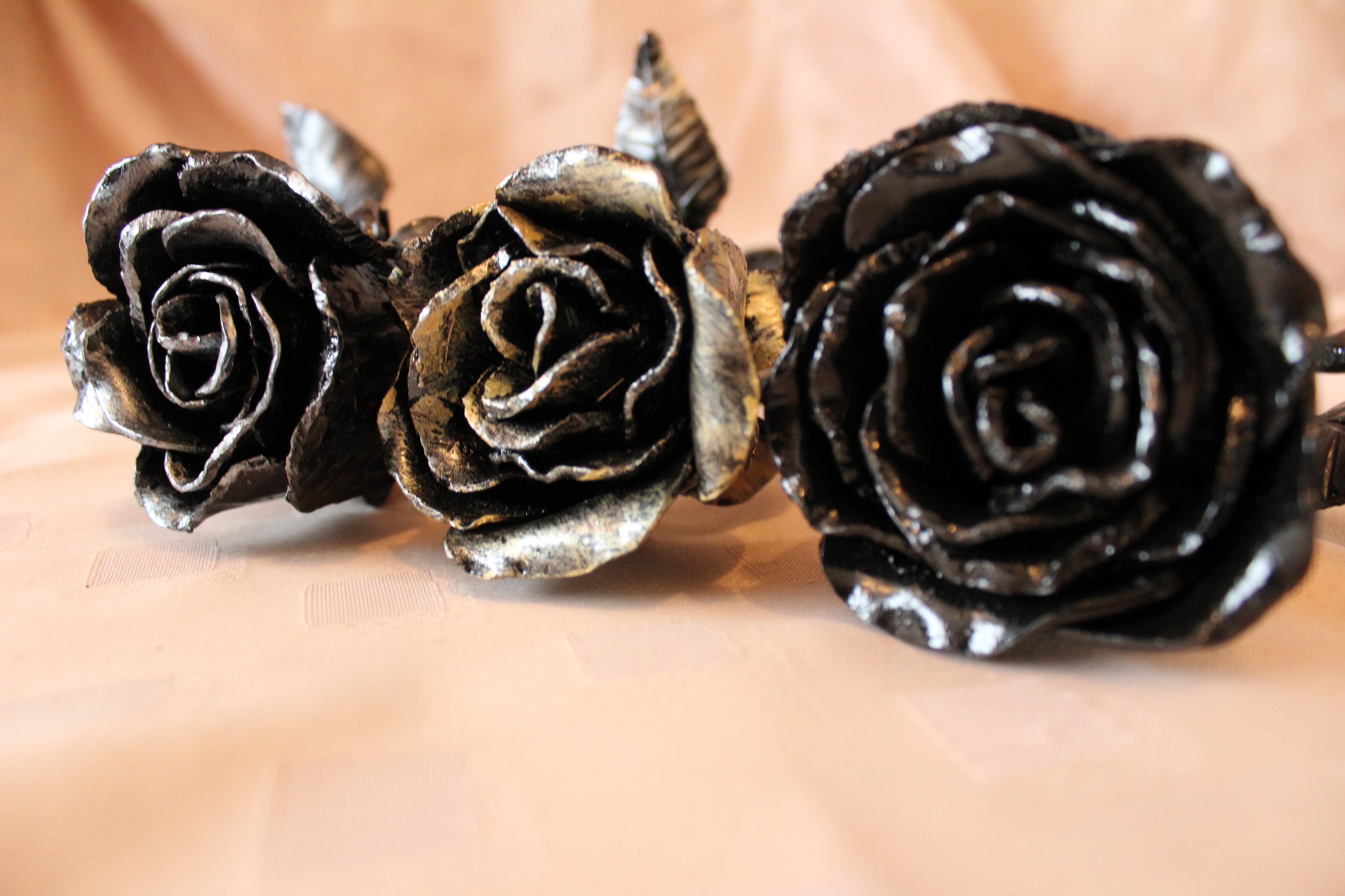 Hand forged metal wrought iron roses