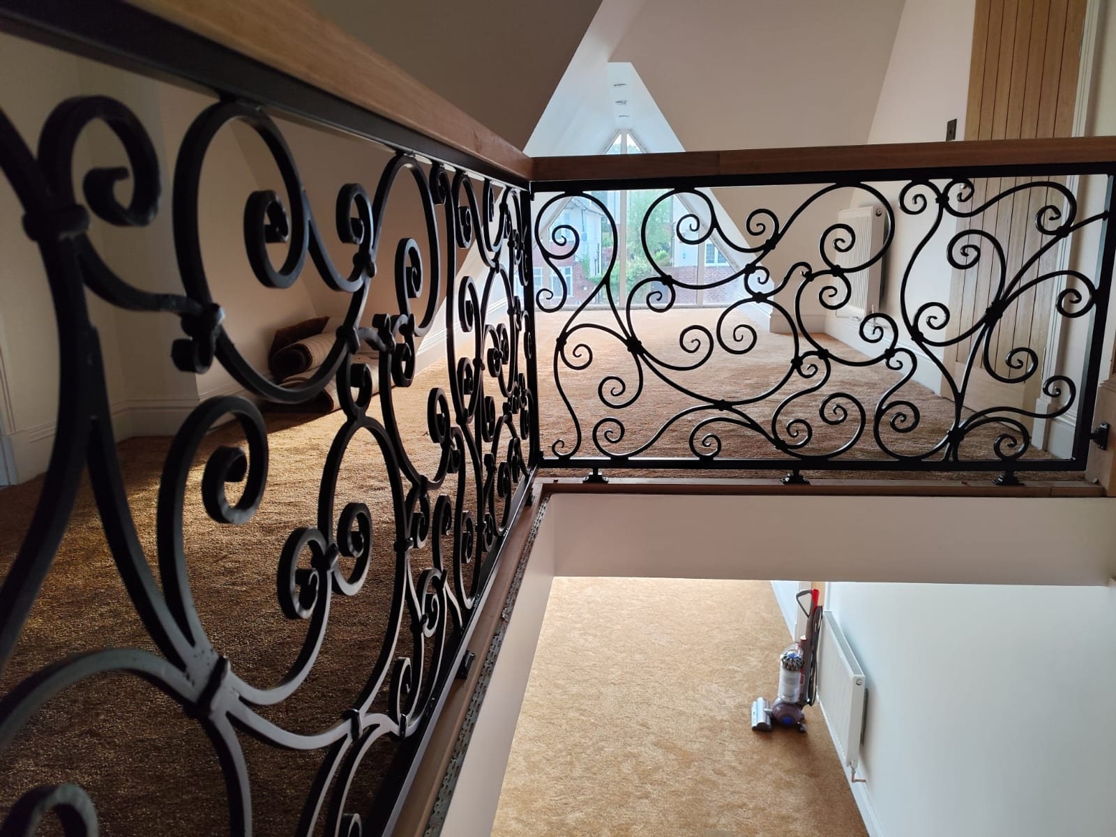 Bespoke Hand Forged Iron Staircase Railing – Elegant Scrollwork. 46