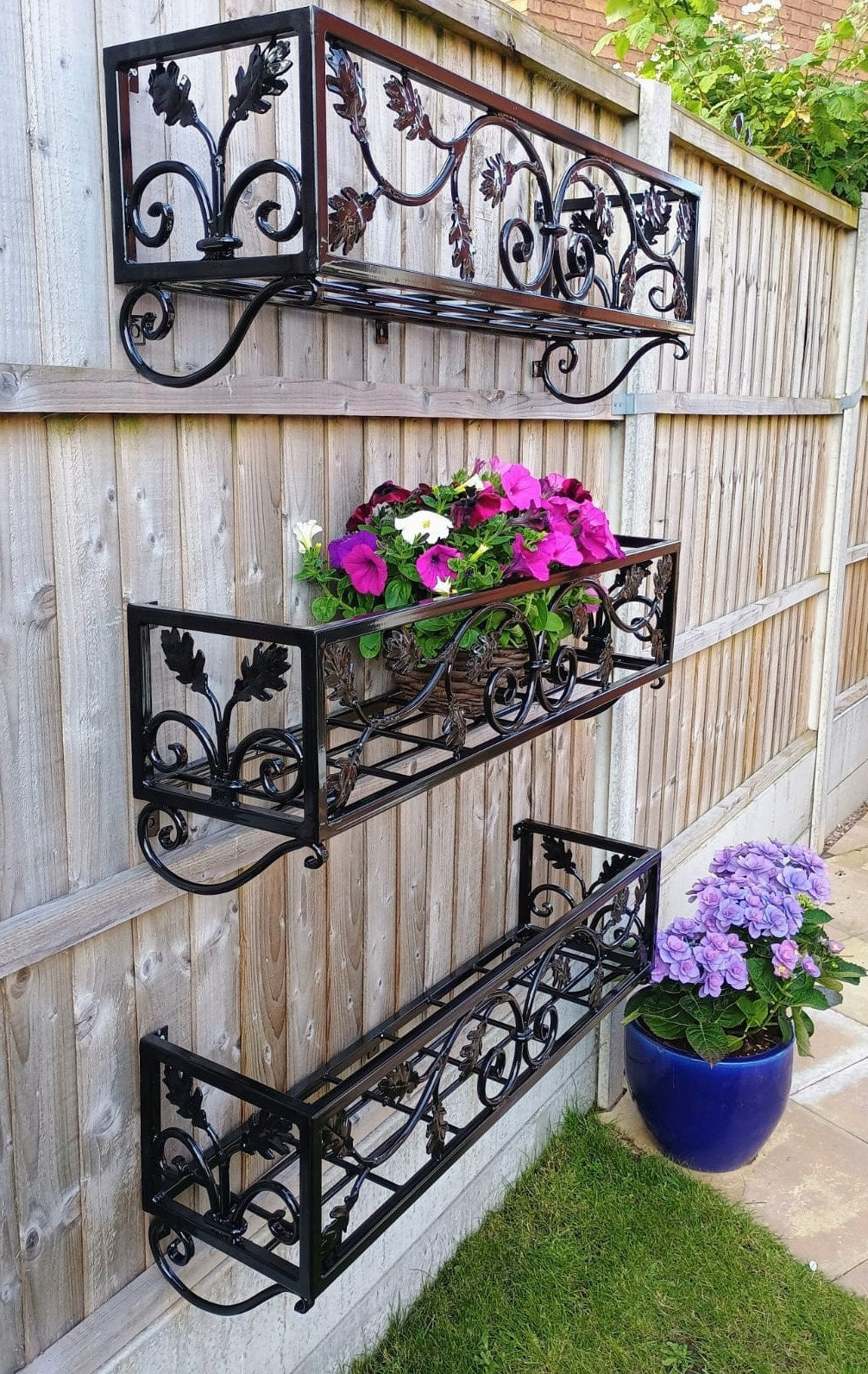 Hand Forged Metal Wall Planter Basket - Leaf Scroll Design. 39