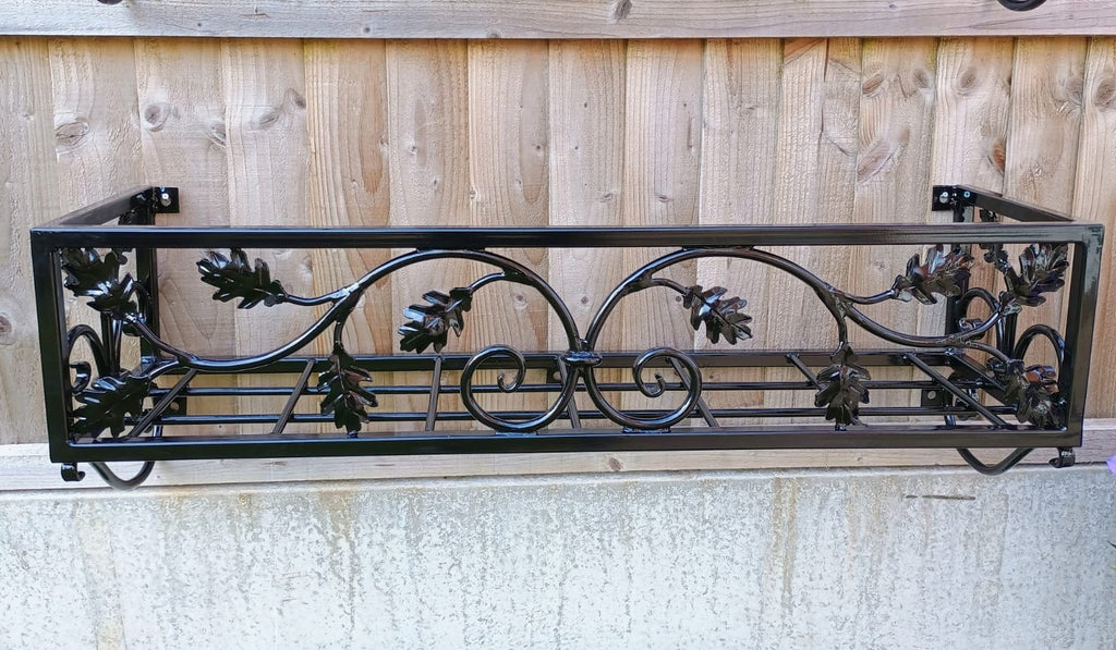 Hand Forged Metal Wall Planter Basket - Leaf Scroll Design. 39
