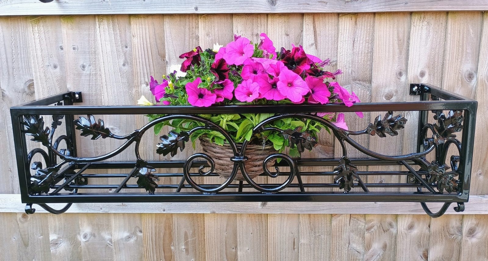 Hand Forged Metal Wall Planter Basket - Leaf Scroll Design. 39