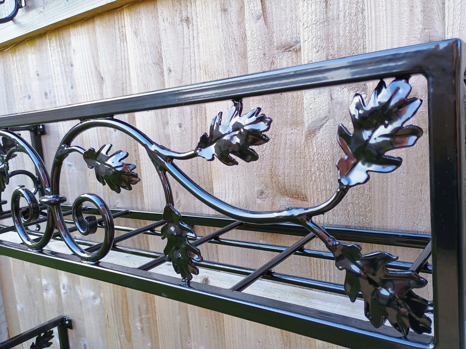 Hand Forged Metal Wall Planter Basket - Leaf Scroll Design. 39