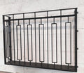 Hand forged Juliet balcony with composite decking floor. 88