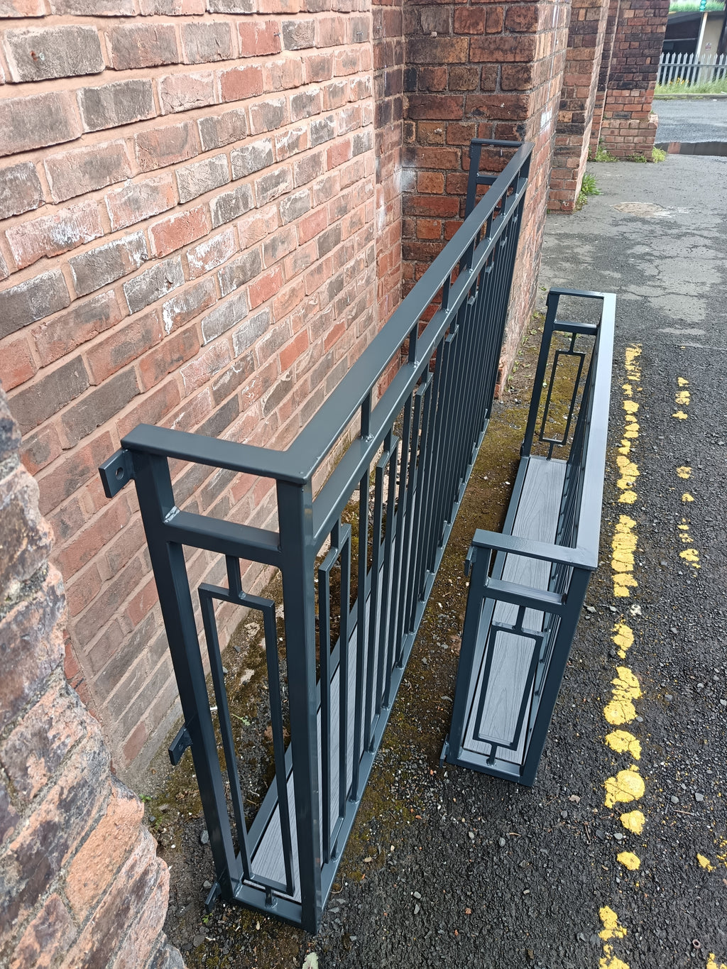 Hand forged Juliet balcony with composite decking floor. 88