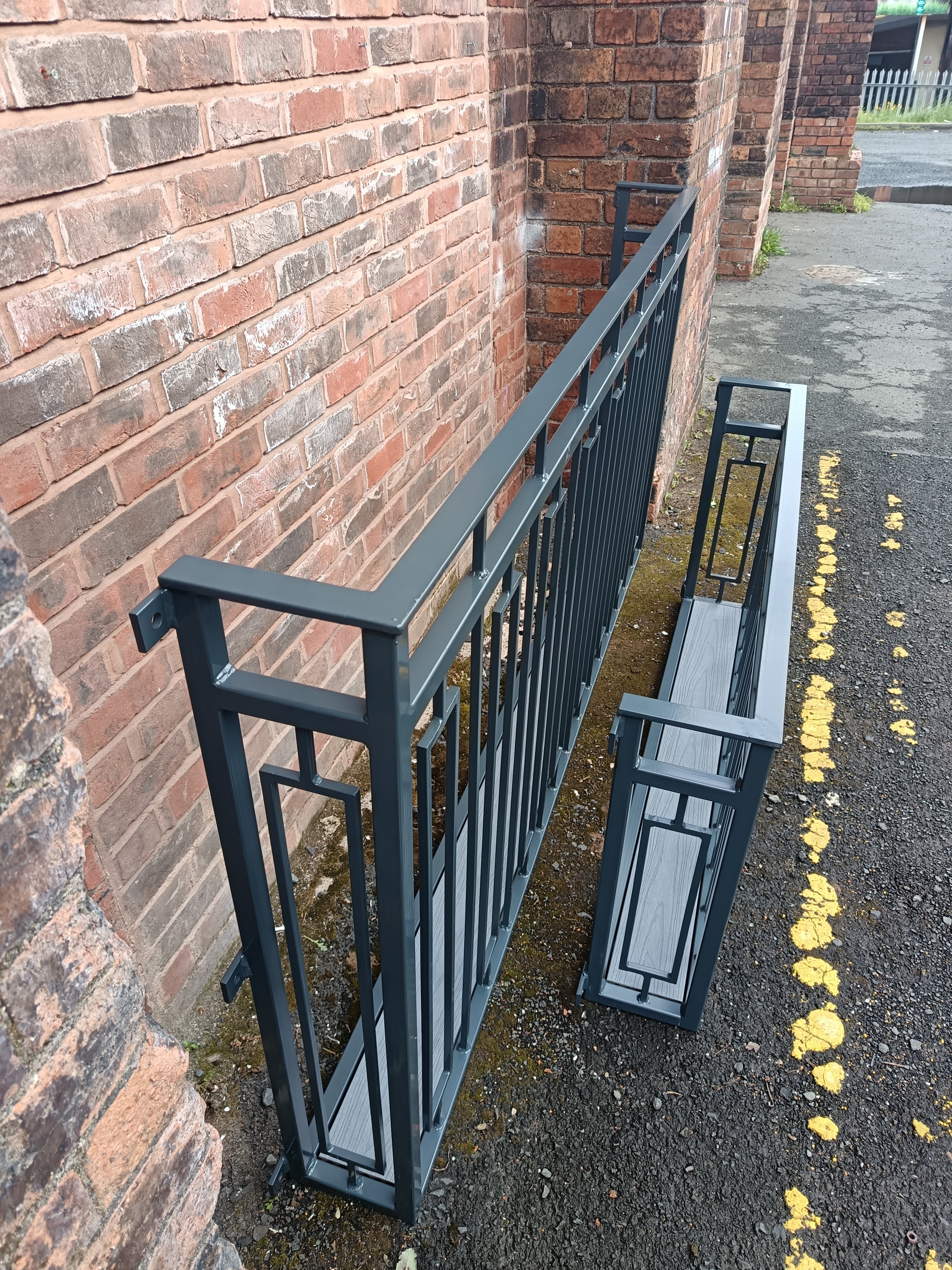 Hand forged Juliet balcony with composite decking floor. 88